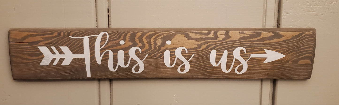 This is us - arrow sign