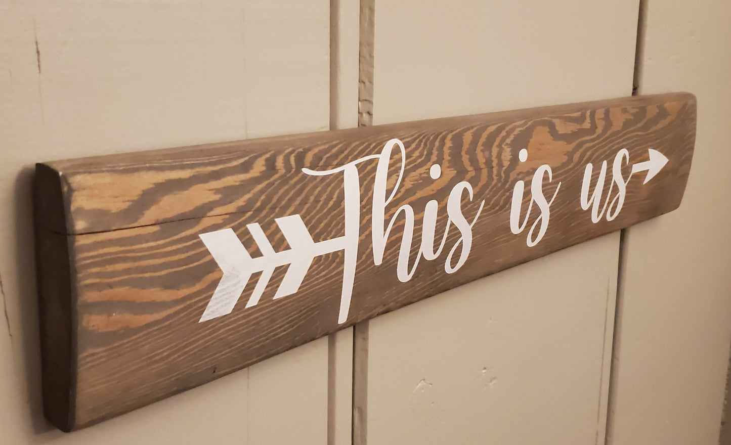 This is us - arrow sign