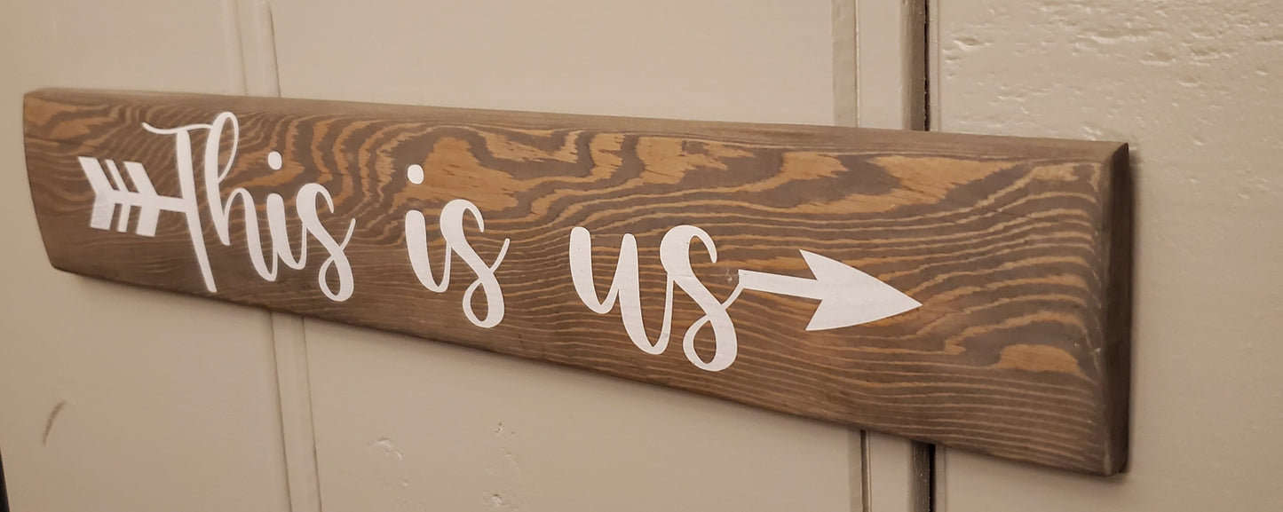 This is us - arrow sign